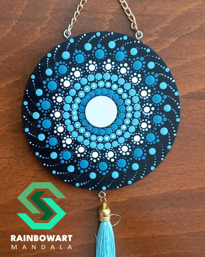آویزدیواری دایره ای چوبی فیروزه ای | کار شده با نقوش ماندالا و دات ماندالا توسط سهیلا میرزایی | ارسال رایگان در رشت | خرید از فروشگاه رینبوآرت
