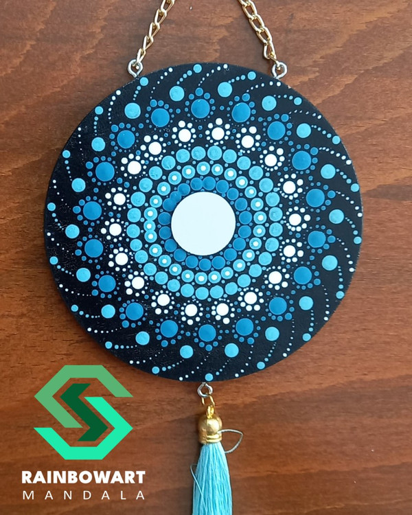 آویزدیواری دایره ای چوبی فیروزه ای | کار شده با نقوش ماندالا و دات ماندالا توسط سهیلا میرزایی | ارسال رایگان در رشت | خرید از فروشگاه رینبوآرت