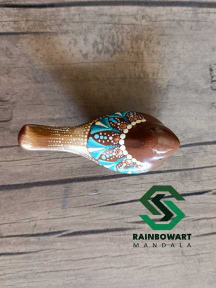 مجسمه دکوری پرنده | طرح ماندالا و دات ماندالا | قهوه ای با نقوش فیروزه ای | کار شده توسط سهیلا میرزایی | خرید از فروشگاه رینبوآرت