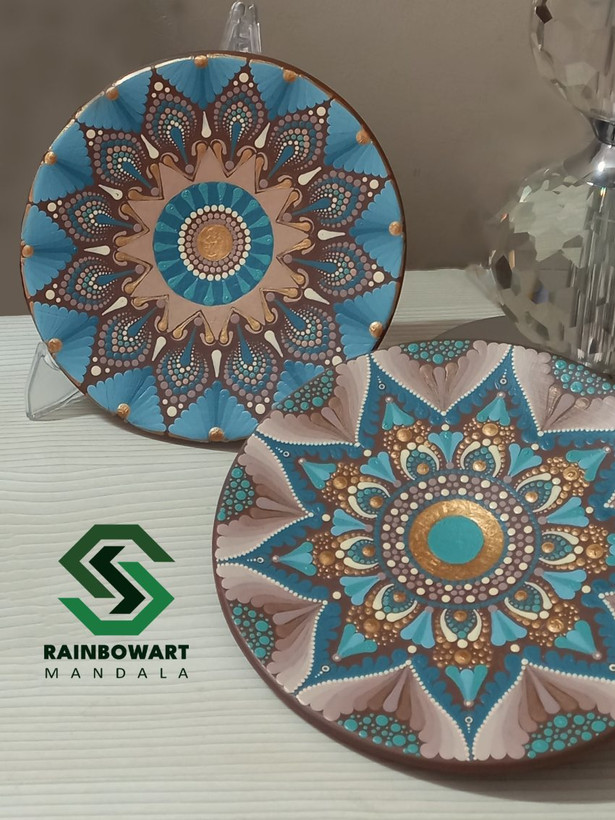 خرید دیوارکوب سفالی فیروزه ای و قهوه ای با نقوش ماندالا و دات ماندالا | ساخته شده توسط سهیلا میرزایی | خرید از فروشگاه رینبوآرت | ارسال رایگان در رشت