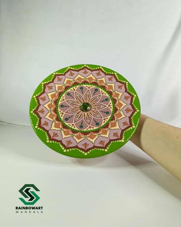 دیوارکوب سفالی با طرح ماندالا و دات ماندالا درست شده توسط سهیلا میرزایی