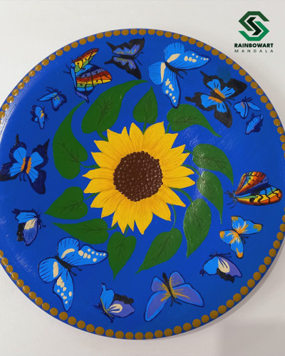 خرید دیوارکوب سفالی آبی تزئینی با نقوش دات ماندالا از فروشگاه رینبوآرت | نقوش آفتابگردان | ارسال رایگان در رشت
